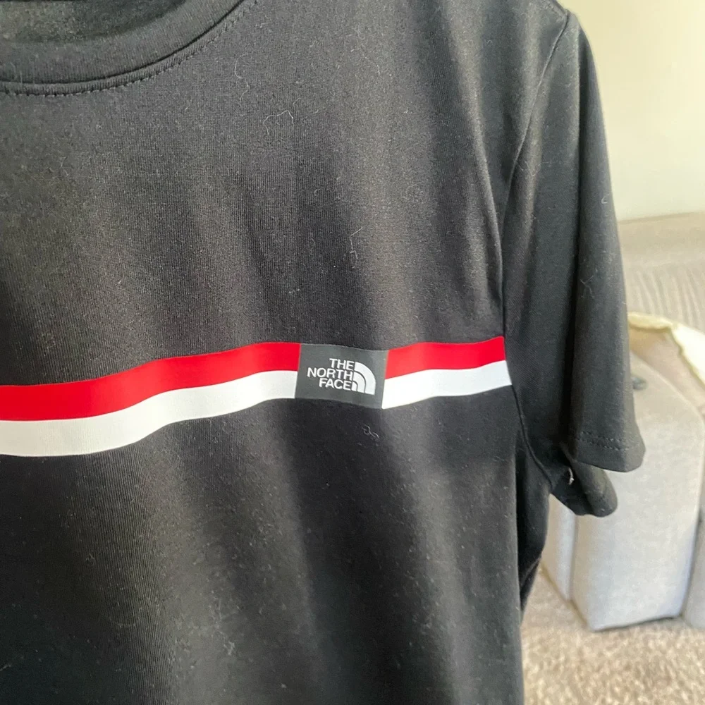 The North Face Black Tee with Red and White stripe - Picture 3 of 4